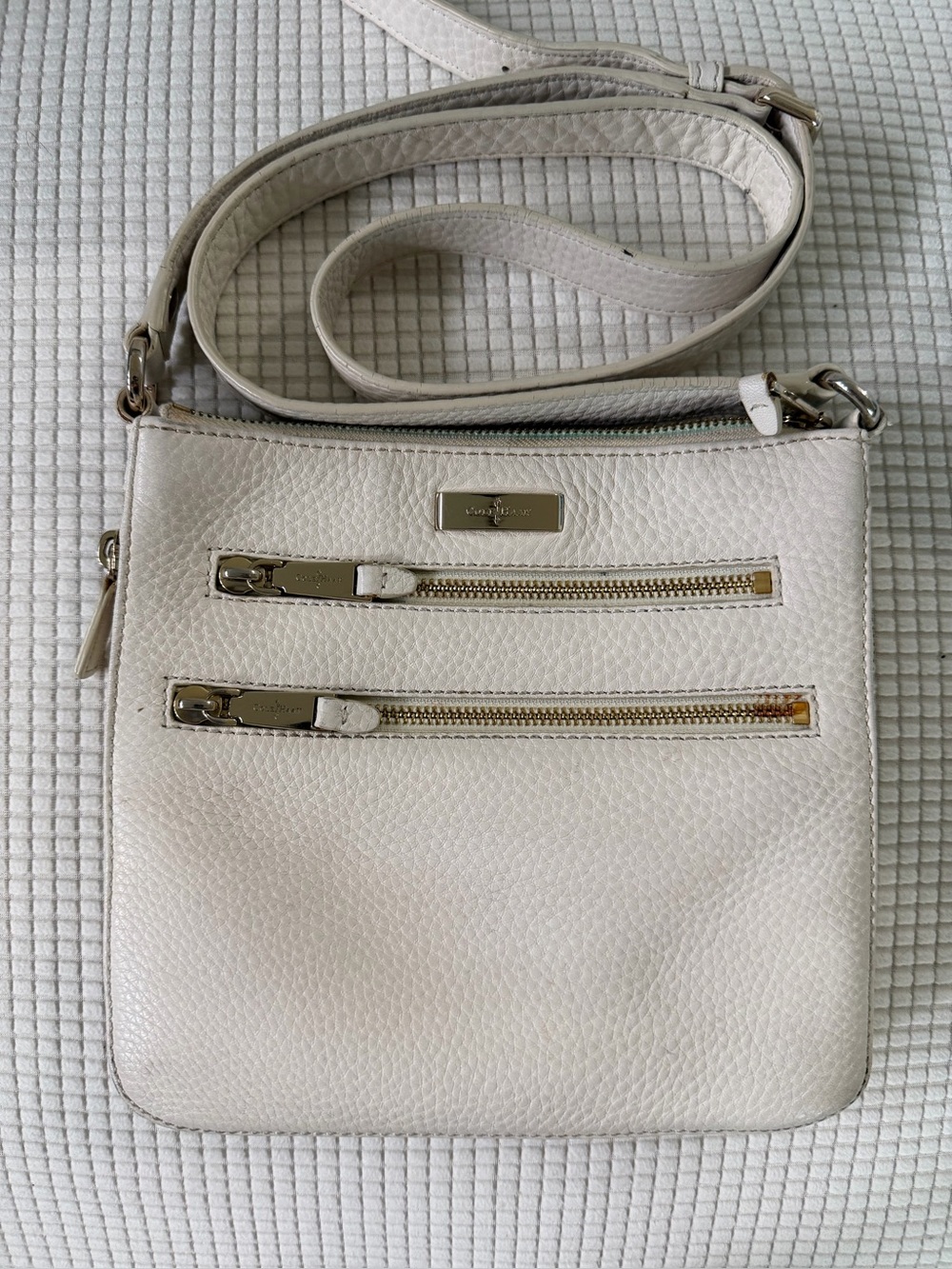 Cole Haan pebbled leather crossbody swingpack bag